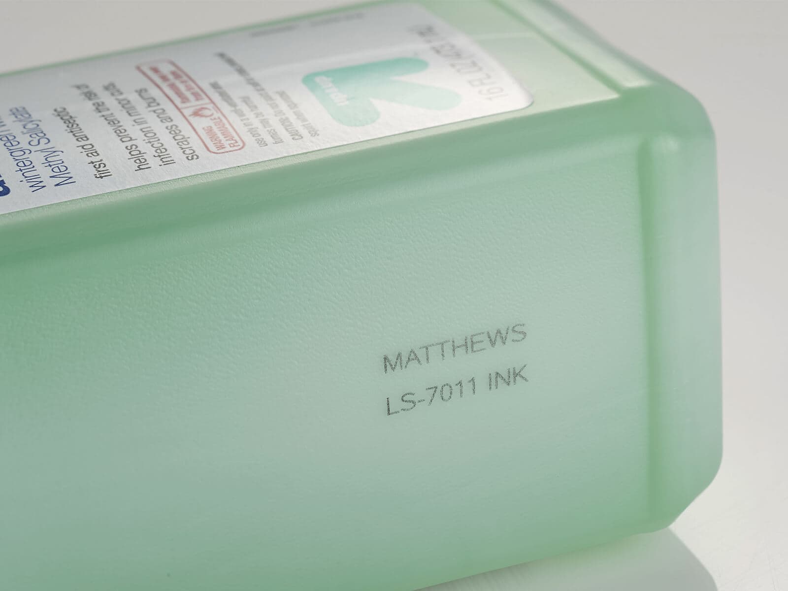 Marcatura su confezione di alcool con tecnologia getto di inchiostro a cartucce di Matthews Marking Systems
