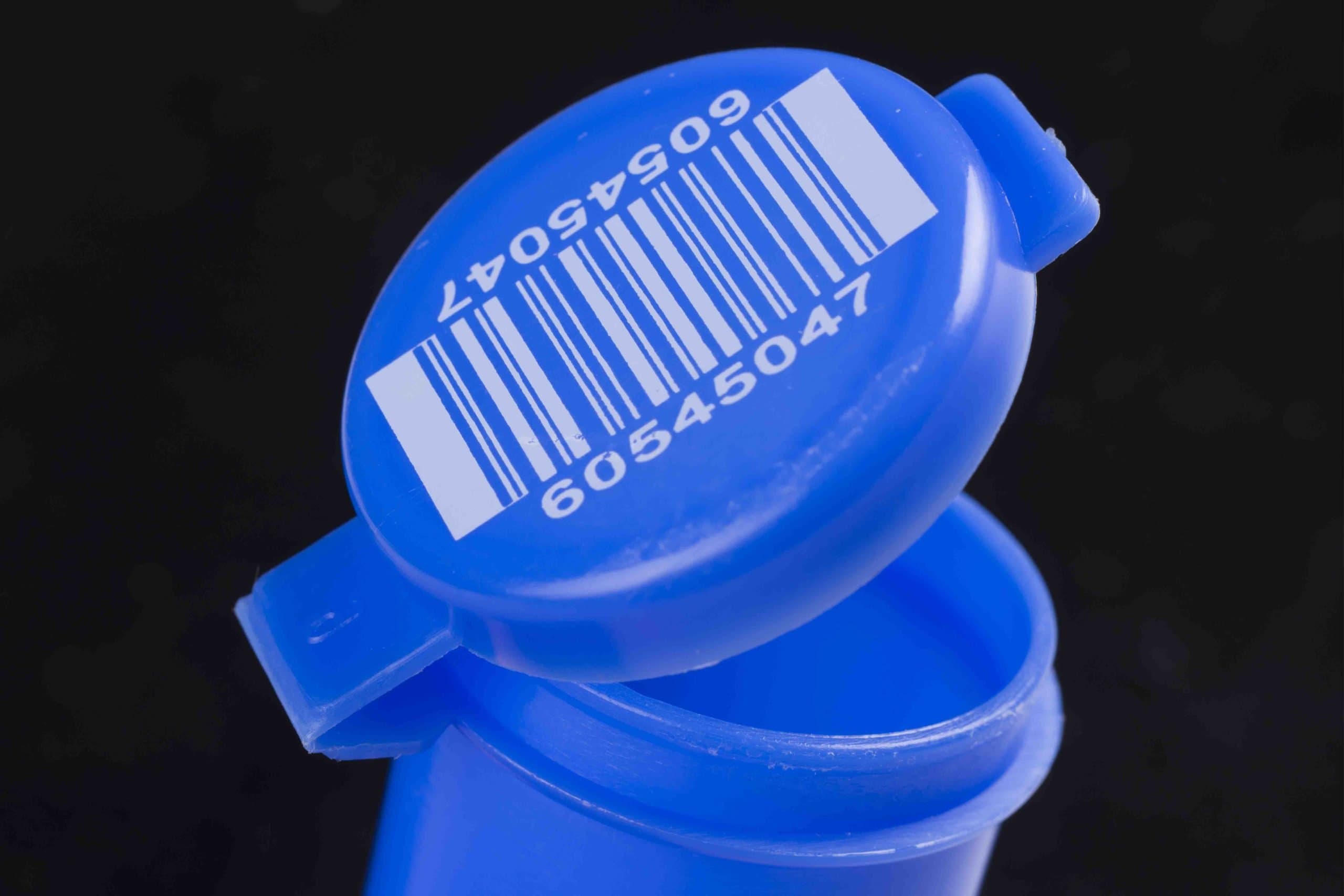 Marcatura a trasferimento termico diretto su oggetti su tappo in plastica
