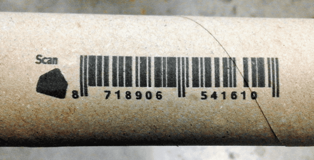 Marcatura a getto di inchiostro a cartucce di codice a barre su anima in cartone altamente porosa